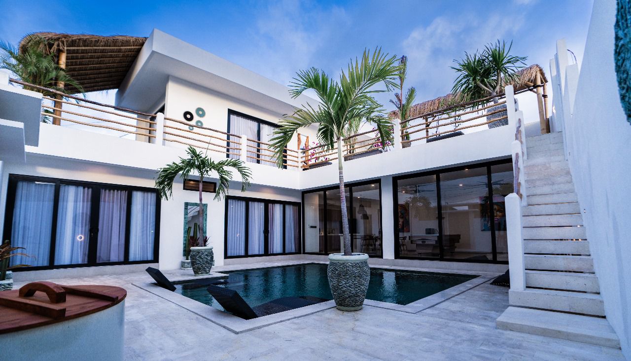 Villa Amazonica facade and pool by day