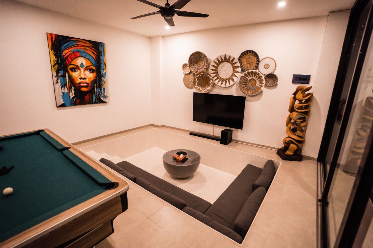 Sunken lounge with African art at Villa Amazonica